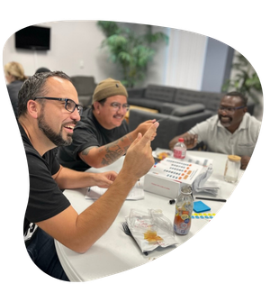 Team planning strategy on a whiteboard